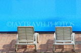 SRI LANKA, Negombo, two sunbeds by swimming pool, SLK3544JPL