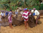 SRI LANKA, south coast, Ambalangoda, fishermen sorting net after catch, SLK1583JPL