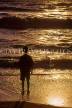 SRI LANKA, south coast, Mount Lavinia, sunset and boy on beach, SLK1991JPL