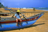 SRI LANKA, south coast, child on catamaran, SLK180JPL