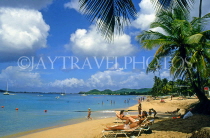 ST LUCIA, Reduit Beach and sunbathers, STL693JPL