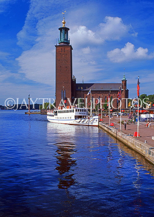 SWEDEN, Stockholm, City Hall (Stadshuset) and pleasure boat, SWE152JPL