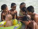 THAILAND, Koh Lipe Island, sea gypsy children playing with a tourist baby, THA1967JPL