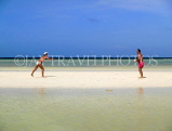 THAILAND, Koh Tao Island, couple playing paddleball on beach, THA2004JPL