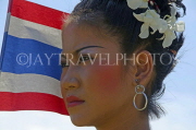 THAILAND, Surin, elephant festival, dancer with flag, THA2127JPL