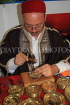TUNISIA, crafts, brassware, worker engraving, TUN23JPL
