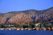 TURKEY, Fethiye, coastal view with pleasure boats lined up, TUR589JPL