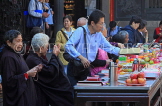 Taiwan, TAIPEI, Lungshan Temple, worshippers by temple offerings, TAW698JPL