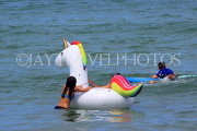 Thailand, PHUKET, Patong Beach, children at sea, playing with float, THA4200JPL