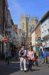 UK, Yorkshire, YORK, shopping street scene with York Minster in background, UK3271JPL