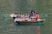 VIETNAM, Halong Bay, boat vendors with snacks for selling to cruise boat tourists, VT1890JPL