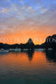 VIETNAM, Halong Bay, dawn, limestone formations and moored cruise boats, VT1814JPL